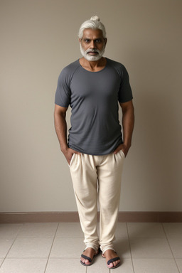 Indian middle-aged male with  white hair