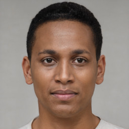 Neutral latino young-adult male with short  black hair and brown eyes